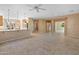 Open floor plan with kitchen and living room at 12750 W Jasmine Trl, Peoria, AZ 85383