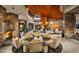 Elegant community clubhouse lobby with stone fireplace and comfortable seating at 12750 W Jasmine Trl, Peoria, AZ 85383