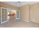 Bright home office with French doors leading to the kitchen at 12750 W Jasmine Trl, Peoria, AZ 85383