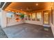 Covered patio featuring a fireplace, creating a warm and inviting outdoor living space at 12750 W Jasmine Trl, Peoria, AZ 85383