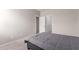 Bedroom with carpet floors and two doorways at 12937 W Highland Ave, Litchfield Park, AZ 85340