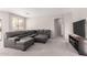 Comfortable living room with plush seating, neutral tones, and ample space at 12937 W Highland Ave, Litchfield Park, AZ 85340