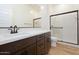 Bathroom featuring modern vanity, undermount sink, and a walk-in shower at 1436 E Cherrywood Pl, Chandler, AZ 85249