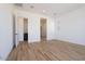 Well-lit bedroom featuring tile flooring, a doorway, and a window view at 1436 E Cherrywood Pl, Chandler, AZ 85249