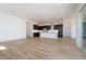 Spacious living area and modern kitchen with tile flooring and recessed lighting at 1436 E Cherrywood Pl, Chandler, AZ 85249