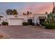 Charming one-story home with a private entry, two-car garage, and landscaped yard at 145 E Boca Raton Rd, Phoenix, AZ 85022