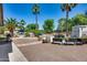 Large backyard with BBQ, landscaping, and pathways at 19326 E Silver Creek Ln, Queen Creek, AZ 85142