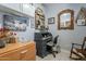 Home office with wooden desk and mirror at 197 N Pottebaum Ave, Casa Grande, AZ 85122