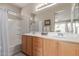 Double sink bathroom with a shower/tub combo and neutral color palette at 21056 E Avenida Del Valle --, Queen Creek, AZ 85142