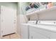 Laundry room with washer, dryer, and overhead shelving at 21056 E Avenida Del Valle --, Queen Creek, AZ 85142