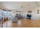 Living room with hardwood floors and large windows at 215 N Power Rd # 440, Mesa, AZ 85205