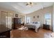 Main bedroom with wood floors and ensuite bathroom at 215 N Power Rd # 440, Mesa, AZ 85205