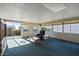 Bright sunroom with ample natural light, comfy seating, and access to the outdoors at 215 N Power Rd # 440, Mesa, AZ 85205