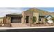 Single-story home with stone accents and desert landscaping at 33580 N Maverick Mountain Trl, San Tan Valley, AZ 85144