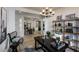 Home office with built-in shelving and a workspace at 33580 N Maverick Mountain Trl, San Tan Valley, AZ 85144