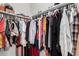 This walk-in closet provides ample storage for clothes, shoes, and accessories at 3481 N 309Th Ln, Buckeye, AZ 85396