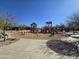 Bright playground with play structures, swings, and benches within well-kept common area at 3481 N 309Th Ln, Buckeye, AZ 85396