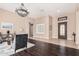 Living area with dark hardwood floors and a chandelier at 3633 E Encanto St, Mesa, AZ 85205