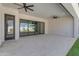 Covered patio with glass doors opening to a pool at 3728 E Mia Ln, Gilbert, AZ 85298