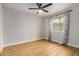 Simple bedroom with light walls and wood-look flooring at 3814 E Wildwood Dr, Phoenix, AZ 85048