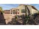 Spacious backyard with desert landscaping and pergola at 3836 N Hidden Canyon Dr, Florence, AZ 85132