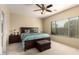 Spacious bedroom with a king-size bed and plenty of natural light at 3836 N Hidden Canyon Dr, Florence, AZ 85132