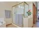 Clean bathroom with a large glass shower and neutral tile floors at 4808 N Litchfield E Knl, Litchfield Park, AZ 85340