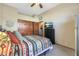 Comfortable bedroom with a ceiling fan and ample closet space at 4808 N Litchfield E Knl, Litchfield Park, AZ 85340