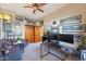 Home office with two desks and a comfortable couch at 4808 N Litchfield E Knl, Litchfield Park, AZ 85340