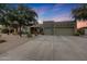 Exterior of a two-story house with a three-car garage at 4808 N Litchfield E Knl, Litchfield Park, AZ 85340