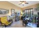 Home office with a comfortable chair and built in shelving at 4808 N Litchfield E Knl, Litchfield Park, AZ 85340