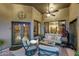 Covered patio with seating area and ceiling fan at 4808 N Litchfield E Knl, Litchfield Park, AZ 85340