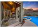 Pool area with patio furniture and a covered seating area at 4808 N Litchfield E Knl, Litchfield Park, AZ 85340