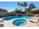 Inviting pool and spa with waterfall feature at 4808 N Litchfield E Knl, Litchfield Park, AZ 85340