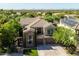 An aerial view of a luxurious home with solar panels and a gated entrance at 5019 E Lucia Dr, Cave Creek, AZ 85331