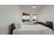 Bedroom with mountain views and built-in desk at 5316 E Valle Vista Rd, Phoenix, AZ 85018