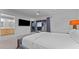 Bedroom with adjacent bathroom and patio access at 5316 E Valle Vista Rd, Phoenix, AZ 85018