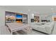 Spacious living area with fireplace and large windows at 5316 E Valle Vista Rd, Phoenix, AZ 85018