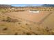Home with fenced arena on large desert lot at 53929 W Bowlin Rd, Maricopa, AZ 85139