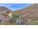 Luxury home nestled on a hillside with a mountain view and private driveway at 6216 W Molly Dr, Phoenix, AZ 85083