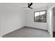 Bright bedroom with ceiling fan and window views at 6216 W Molly Dr, Phoenix, AZ 85083