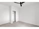 Bright bedroom with ceiling fan and closet at 6216 W Molly Dr, Phoenix, AZ 85083