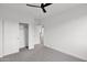 Spacious bedroom with ceiling fan and ample closet space at 6216 W Molly Dr, Phoenix, AZ 85083