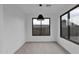Bright breakfast nook with large windows and modern light fixture at 6216 W Molly Dr, Phoenix, AZ 85083