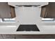 Contemporary kitchen features a sleek three-burner cooktop at 6216 W Molly Dr, Phoenix, AZ 85083