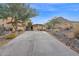 Long driveway leading to a two-car garage at 6216 W Molly Dr, Phoenix, AZ 85083