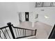 Two-story entryway with a modern, black front door at 6216 W Molly Dr, Phoenix, AZ 85083