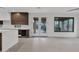 Bright kitchen features double doors opening to a backyard oasis at 6216 W Molly Dr, Phoenix, AZ 85083