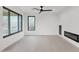 Living room with fireplace and ceiling fan at 6216 W Molly Dr, Phoenix, AZ 85083