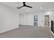 Bright loft area with multiple rooms and access to a bathroom at 6216 W Molly Dr, Phoenix, AZ 85083